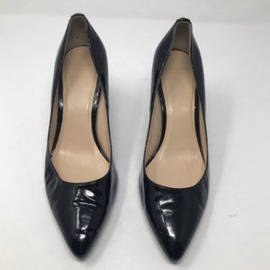 Black leather pointy heels, size 7.5